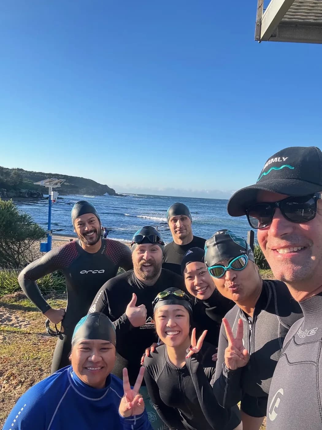 Swimly's ocean squad in wetsuits at Malabar before a swim